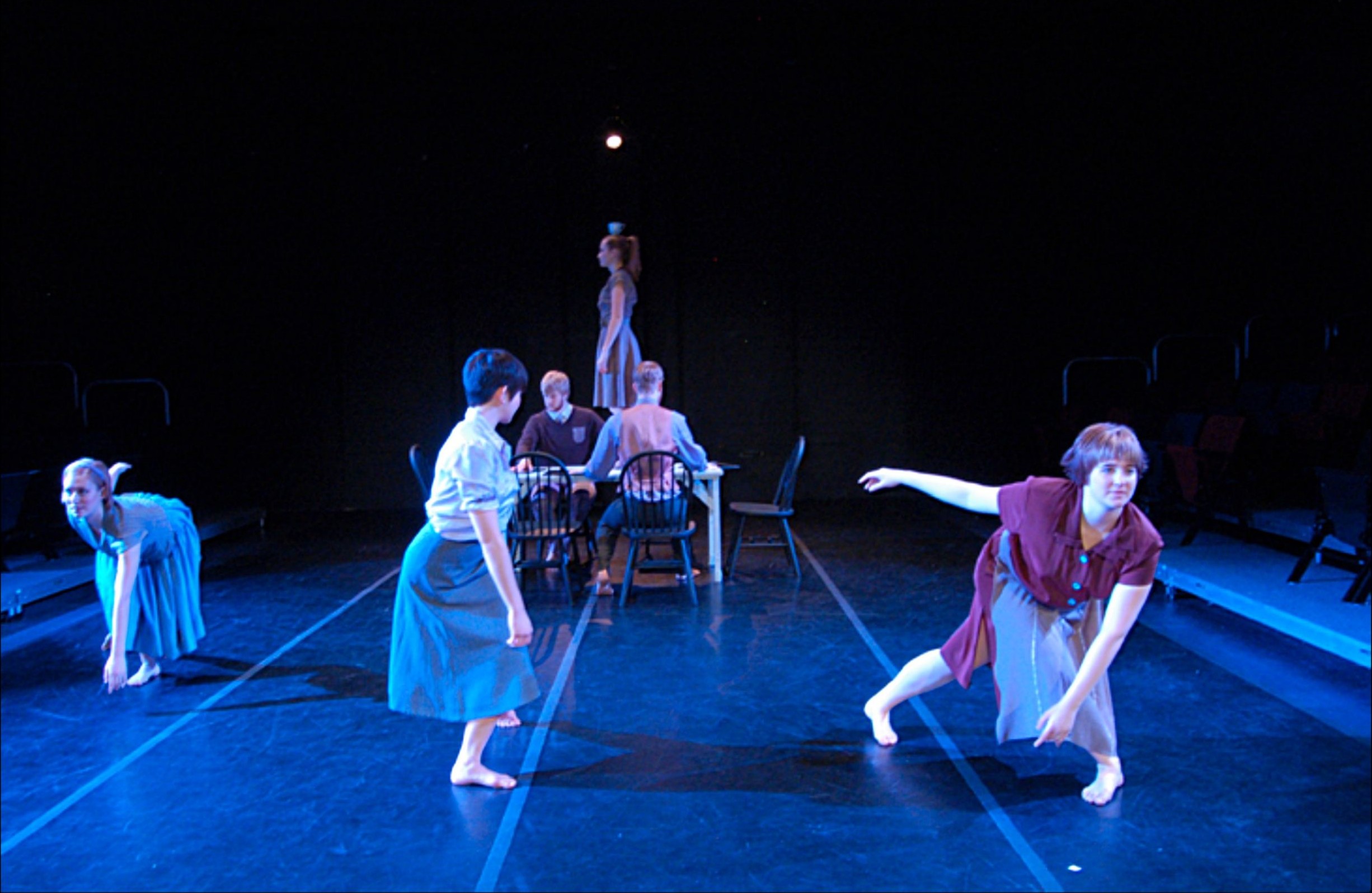 Afterimages — dancers mid-phrase in blue wash