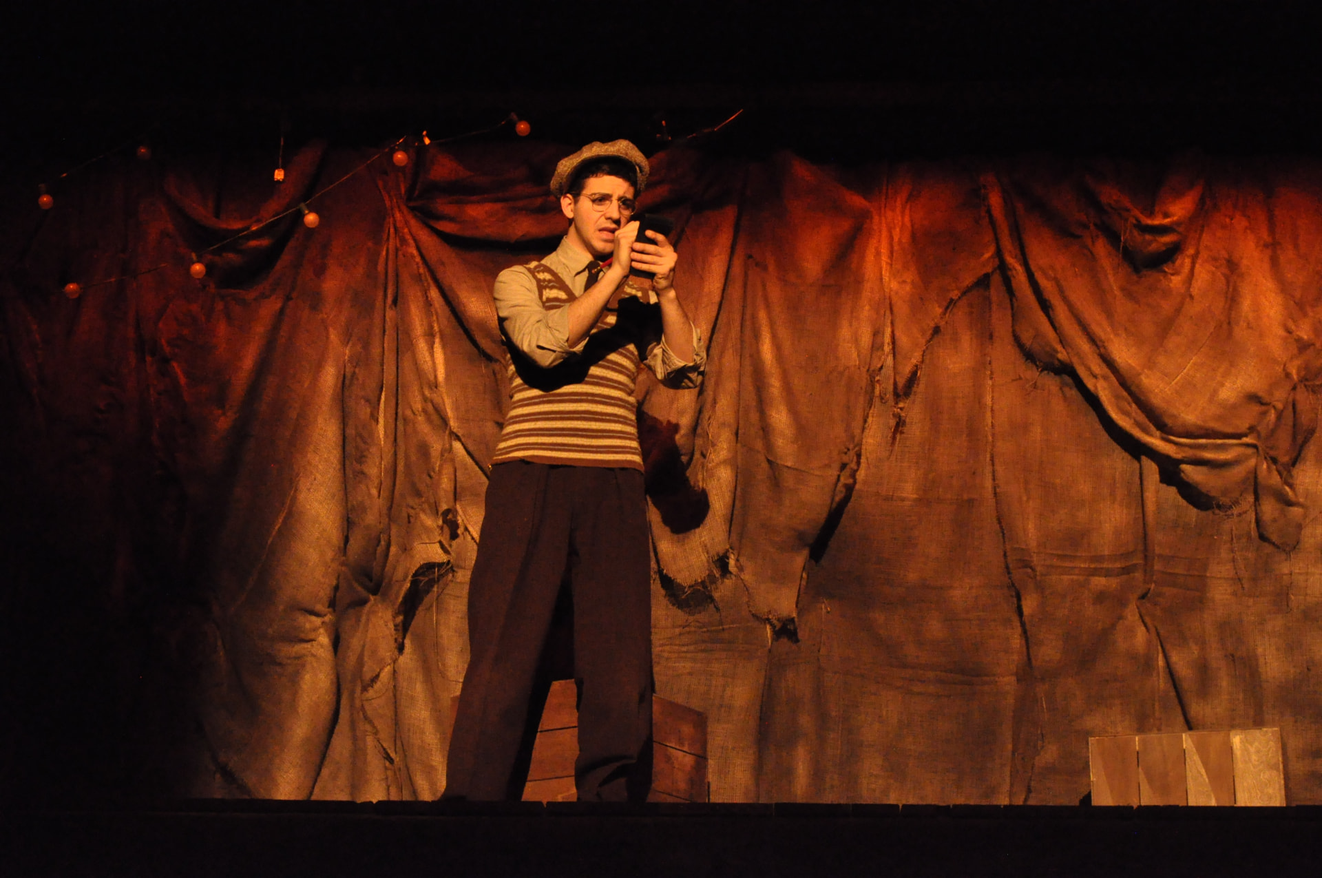 Floyd Collins — Skeets Miller reporting into a microphone before the burlap drop