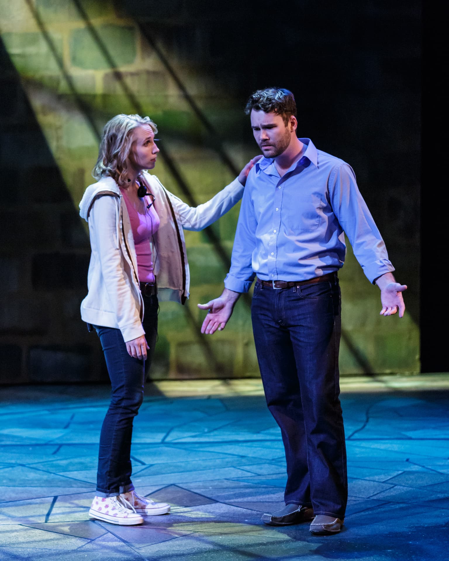 The Understudy — Roxanne on headset consoling Harry downstage