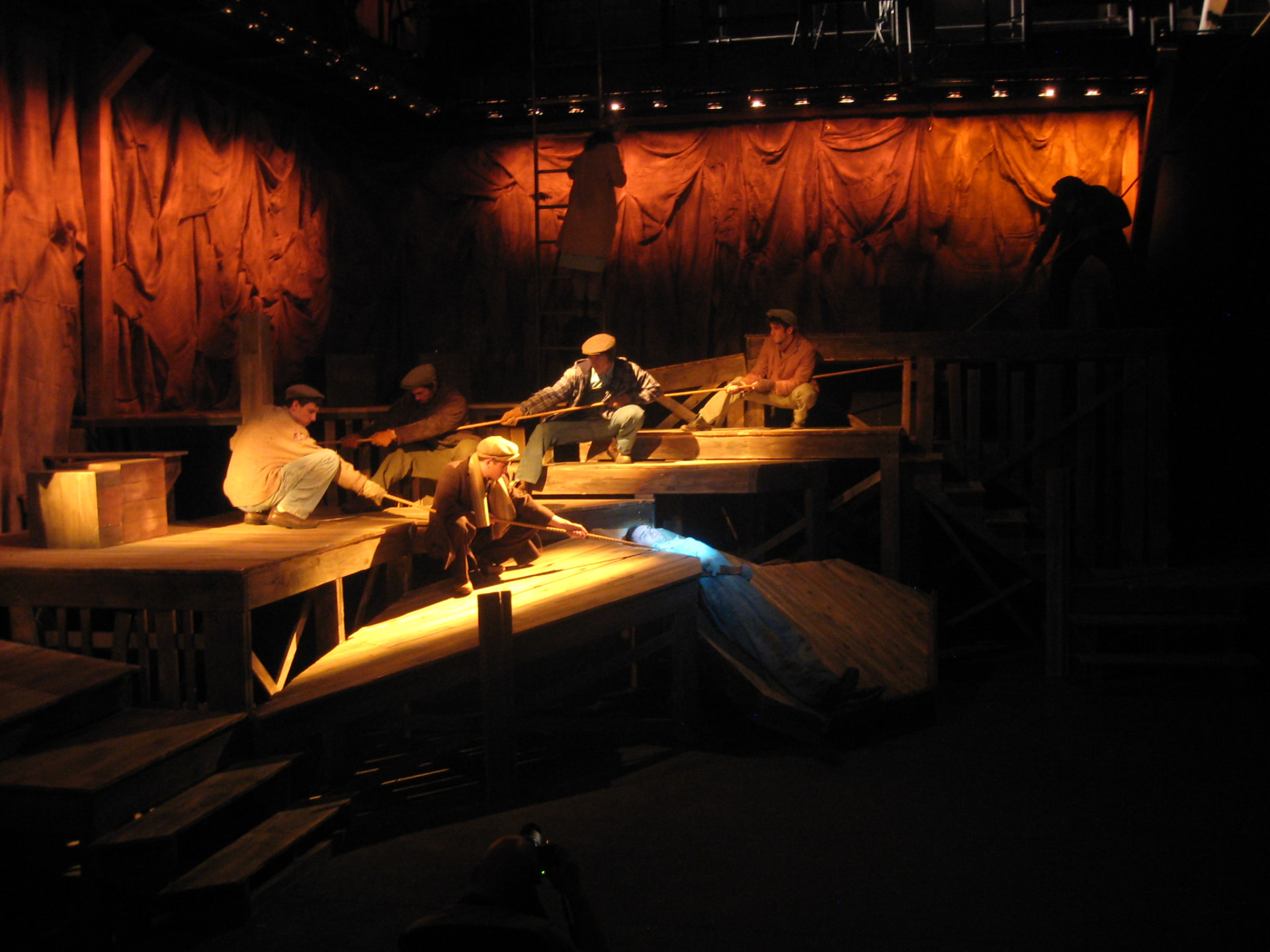 Floyd Collins — the rescue crew hauling rope on the raked platforms