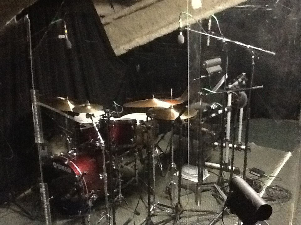 Legally Blonde — drum kit inside an acrylic isolation booth in the pit